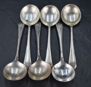 A group of six George V silver Old English pattern soup spoons, with engraved initial H and pip