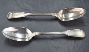 A matched pair of William IV silver fiddle and thread pattern table spoons, each engraved with the