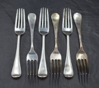 A group of six George V silver Old English pattern forks, with pip to terminal and engraved with