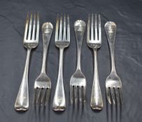 A set of six George III silver Hanoverian pattern table forks, each with engraved dog and crown