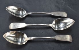 A group of three Victorian Scottish provincial silver table spoons, fiddle pattern with engraved