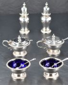 A Queen Elizabeth II six-piece silver condiment set, comprising a pair of baluster pepperettes, pair