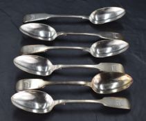 A harlequin set of Victorian silver fiddle pattern spoons, each engraved with winged shield crest,