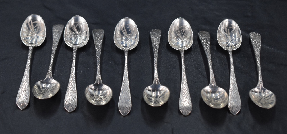 A group of ten Victorian Scottish silver coffee spoons, with pointed terminals and engraved stylised