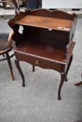 A 19th Century mahogany night stand/bedside pot cupboard having galleried top