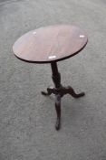 A 19th Century mahogany occasional table having circular top, turned column and triple play legs