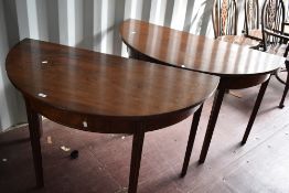 A pair of 19th Century mahogany D end tables with one centre leaf