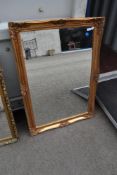 A gilt frame wall mirror, approx 104 x 74cm