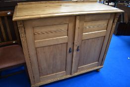 A 19th Century stripped pine side cabinet, width approx. 125cm