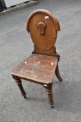 A 19th Century oak hall chair