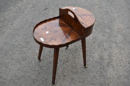 An interesting yew wood butlers table