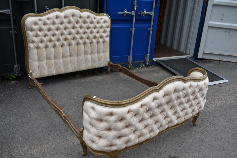 A French style upholstered bed frame , double size