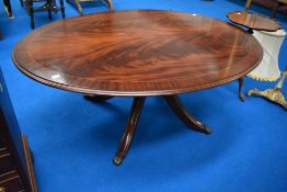 A reproduction Regency oval coffee table