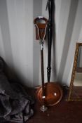 A shooting stick and copper bed warmer