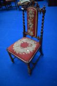 A 19th Century mahogany hall chair having turned and twist frame with tapestry seat and back