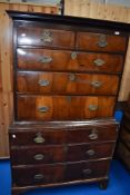An 18th Century and later mahogany and oak chest on chest , having two over three drawers to top