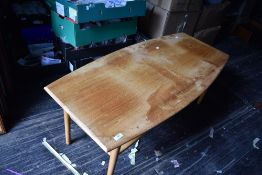 An Ercol style coffee table having slatter undertier, width approx. 120cm