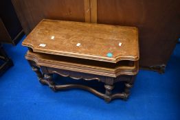 A reproduction classical style stained frame telephone or similar occasional table