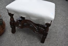 A 19th Century oak frame stool having white/cream leather seat