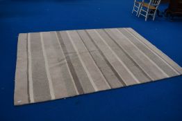 A modern rug, cream stripe pattern , approx 240 x 173cm