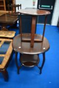 An early 20th Century mahogany occasional table and a smaller oak occasional table