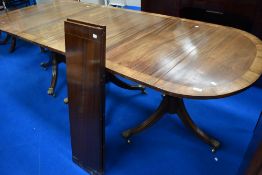 A nice quality reproduction Regency triple pedestal extending dining table, up to 3m in length