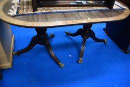 An early 20th Century Regency revival D end dining table with additional leaf