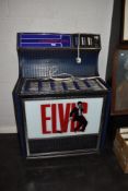 A vintage decorative Elvis themed Juke Box cabinet with workings removed and containing Panasonic CD