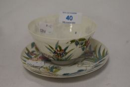 A Japanese egg shell tea bowl and saucers, having hand painted floral scenes with stork with six
