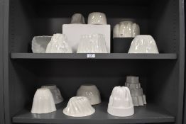 A collection of thirteen ceramic dessert moulds, to include Shelley, Cetem Ware and TG Green