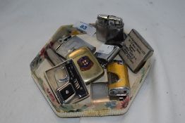 A selection of vintage lighters and a souvenir vesta case, including Orlik and Ronson.