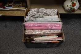 A box of retro bedding, including some unused in packaging.