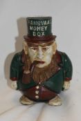 A novelty cast metal money box, Boer War interest, featuring caricatured president 'Transvaal