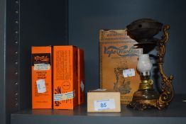 A vintage 'Vapo-Cresolene' vaporiser and boxes of medicated inhalant.