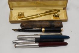 A selection of writing equipment including a Namiki lever fill fountain pen, two Parker 51