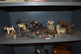 A mixed lot of vintage and antique items of dog related interest, including terrier and spaniel cast