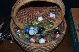 A variety of antique glass marbles.