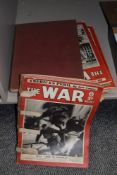 A collection of 'The War' magazine and a book of similar interest.