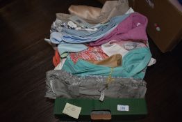 A box of high quality ladies blouses and shirts, many items appear to be unworn, some with tags,