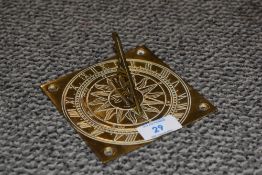 A 20th century brass sundial.
