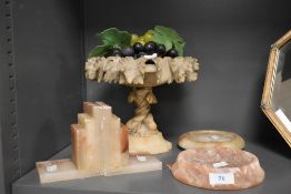 A 19th century carved natural stone tazza, AF, and a similar pair of Art Deco book ends etc.