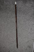 A hallmarked silver topped bamboo walking cane.