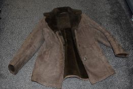 A vintage sheepskin jacket, size label of 16.