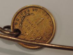 A USA 1849 Gold Dollar made into a Stick Pin