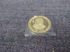 A 21K Gold Commemorative Medallion, 16g, King Faisal Bin Abdul Aziz reign of the Kingdom of Saudi