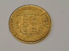 A Queen Victoria 1873 Gold Half Sovereign, Shield Back, Young Head, Die Number 195, in very good
