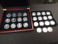 A collection of 27 proof crown-sized 2006 Coins, possibly Silver commemorating HM Queen Elizabeth II