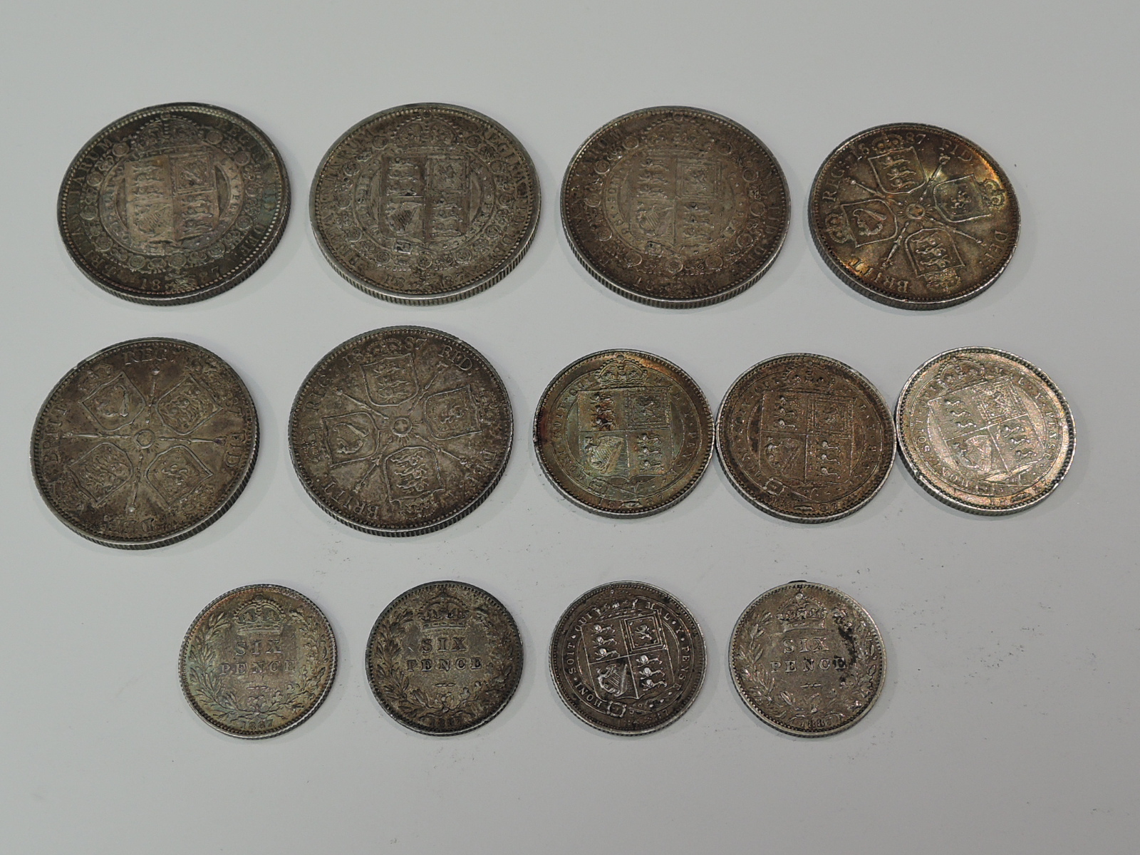 A collection of Queen Victoria 1887 & 1888 Silver Coins, Half Crown x 3, Florin x 3, Shilling x 3 - Image 2 of 2