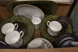 A part Casa Pupo dinner service in in brown with black and white banding (green with relief oak leaf