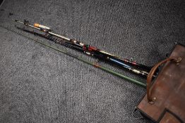 A selection of boat fishing rods & reels and assorted tackle